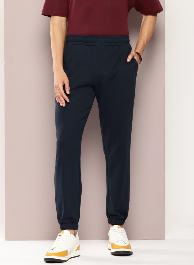 Dillinger Men Navy Blue Solid Joggers - Image 1